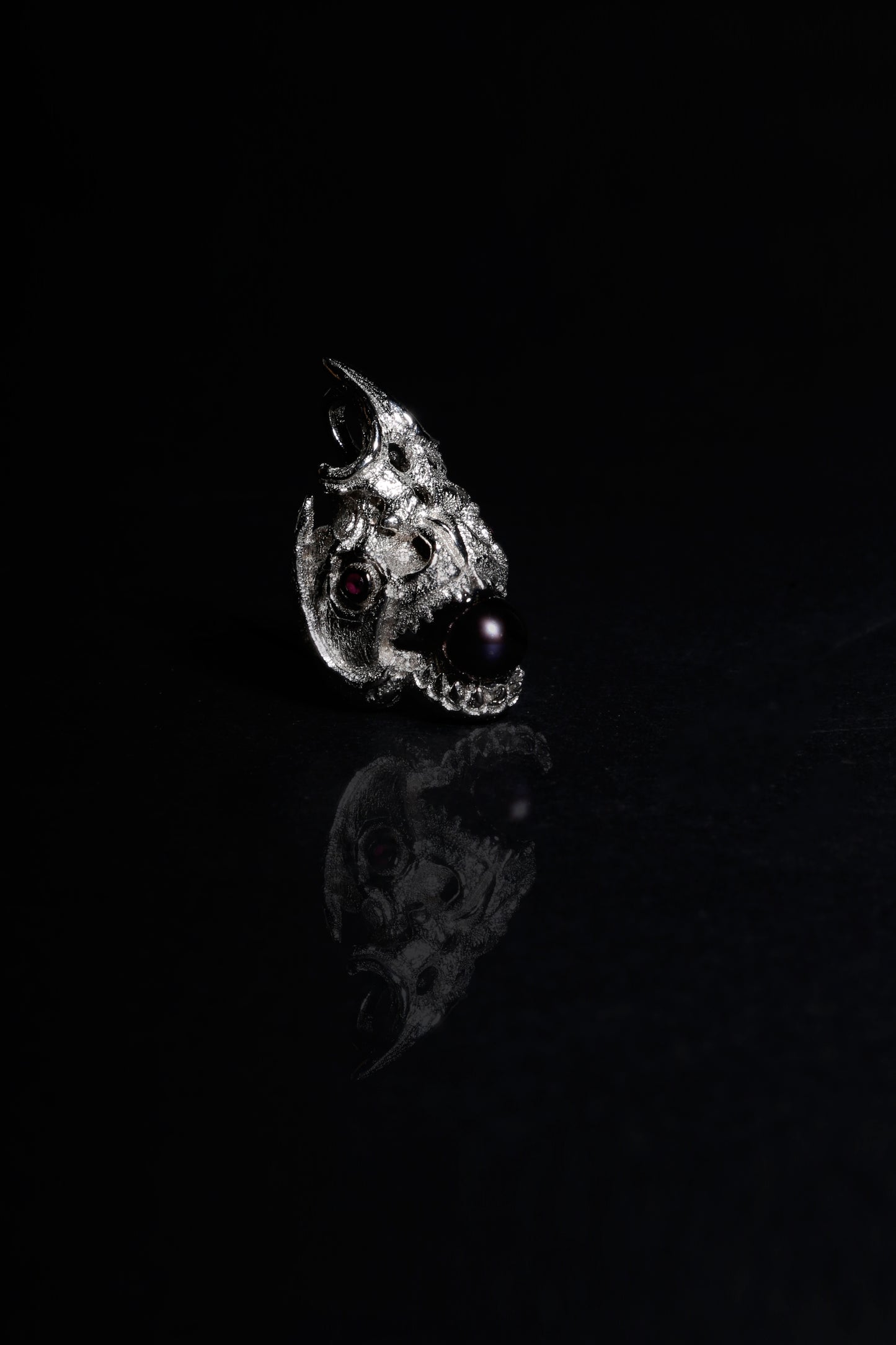 The Ruby-Eyed Piranha Skull Pendant